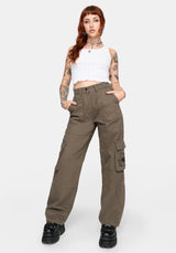 Woman wearing brown cargo pants on a white background