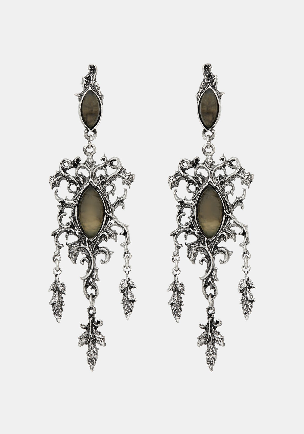 A pair of ornate silver-toned filigree dangle earrings with oval brown stone accents, shown against a light gray background.